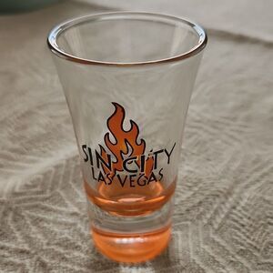 5/$15 Sin City Las Vegas shot glass with orange flames,never used